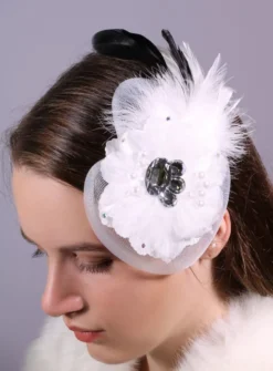 Bibi pour cheveux avec plume
