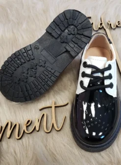 Chaussures bicolores noires et blanches pour cérémonie mixte