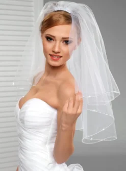 Voile de mariée couture couture et perles cousues
