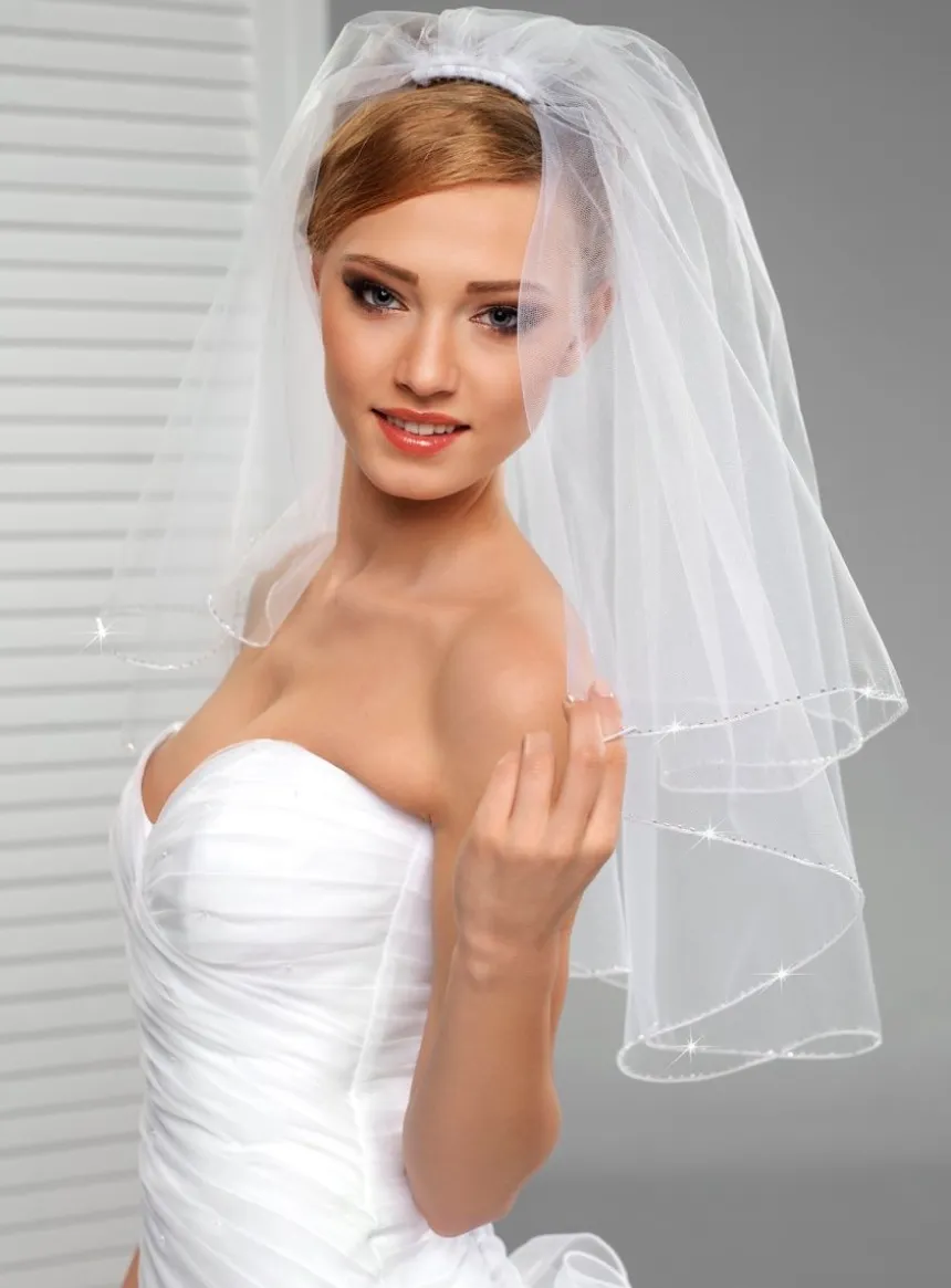 Voile de mariée couture couture et perles cousues